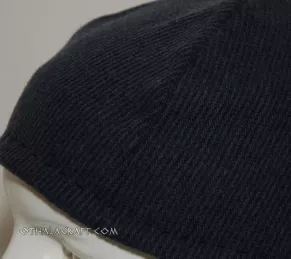 Dark blue woolen hat.