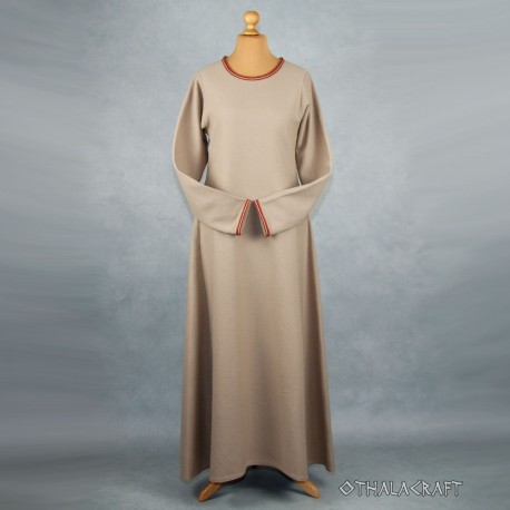 Beige dress with woolen braid