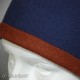 Woolen hat with brown braid