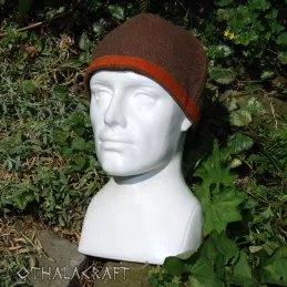 Simple hat made of brown wool (94%) in diamond pattern. Hat has four wedges, based on findings (Birka).