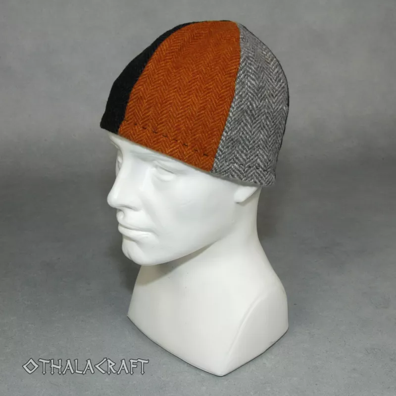 Beautiful hat, made of three colors of wool (98%) in six wedges.