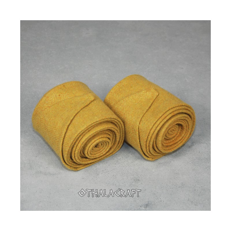 A pair of leg wraps, made from 100% wool in a diamond pattern