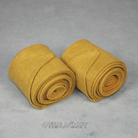 A pair of leg wraps, made from 100% wool in a diamond pattern