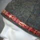 Woolen hat in diamond pattern decorated with silk