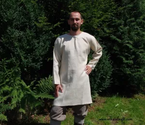 Simple T-tunic made of 100 % linen fabric in ivory color, based on a find from Birka (Sweden).