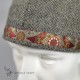 Woolen hat in diamond pattern decorated with silk