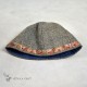 Woolen hat in diamond pattern decorated with silk