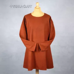 Simple T-tunic made of 100 % woolen fabric in brown color.