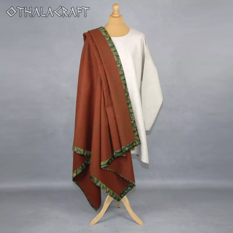 Handwoven cape made of 100% wool in a diamond pattern.