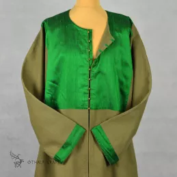 Green woolen kaftan with silk and buttons.