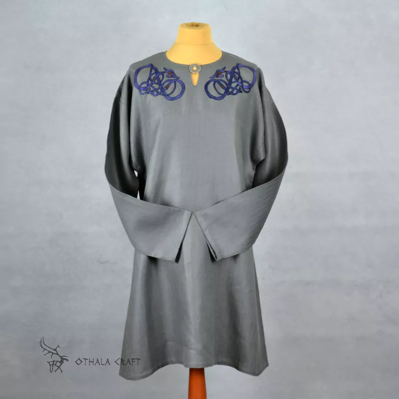 Decorated Viking tunic made of dark orange linen. Shape based on a find from Birka (Sweden),