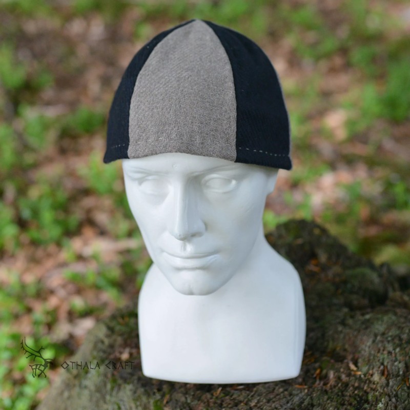 Hat made of dark blue and beige wool, making it the perfect hat for cold days.