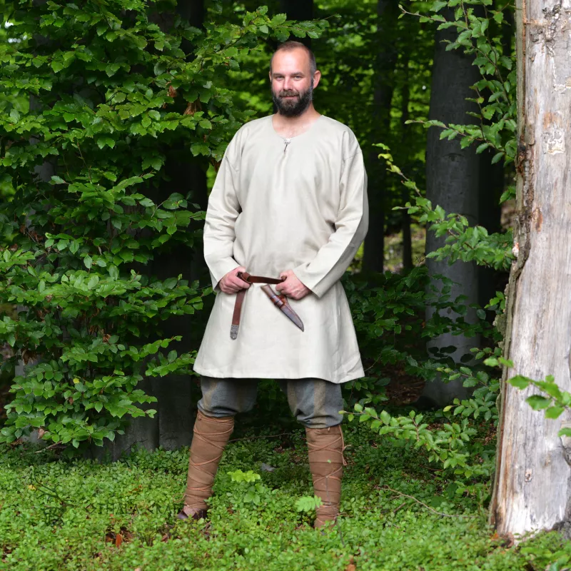 Simple viking T-tunic made of linen fabric in natural ivory color.