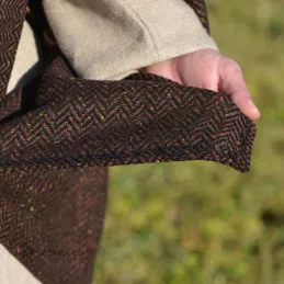Brown woolen cape in herring bone pattern