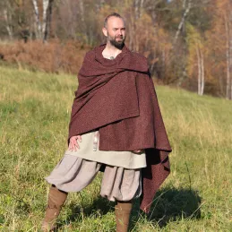 Cape made of wool in a herring bone pattern with alternating dark red, dark brown, black colors
