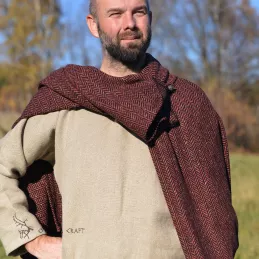 Dark red woolen cape in herring bone pattern