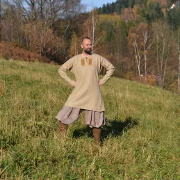 Woolen tunic with embroidery from ship burial Sutton Hoo, Vendel