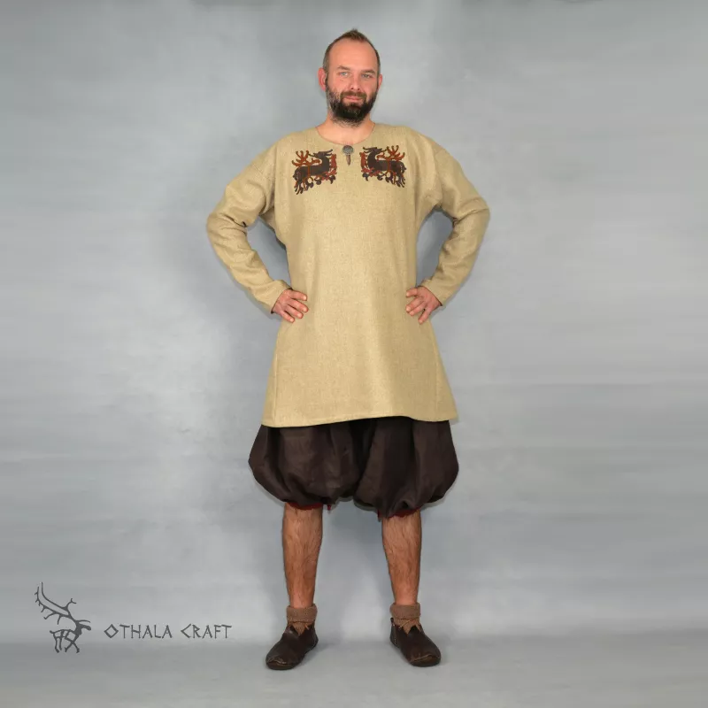 Trousers made from brown linen and dark red linen. Shape based on find from Haithabu, short tided under the knee.