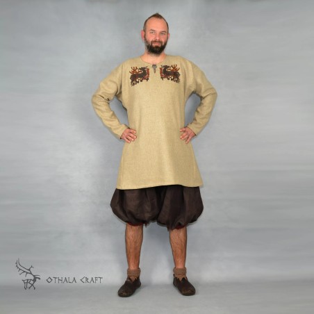 Trousers made from brown linen and dark red linen. Shape based on find from Haithabu, short tided under the knee.