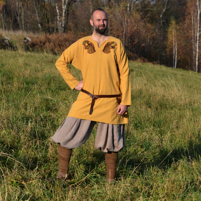 Decorated Viking tunic made of linen in yellow kolor. Shape based on a find from Birka (Sweden), 8th-9th cent.