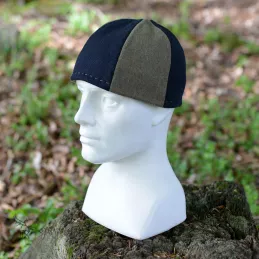 Hat made of thicker, dark blue and green wool. Hat has six wedges, based on findings (Birka).
