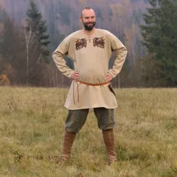 Decorated Viking tunic made of herringbone wool, light beige in color. Shape based on a find from Birka (Sweden), 8th-9th cent.