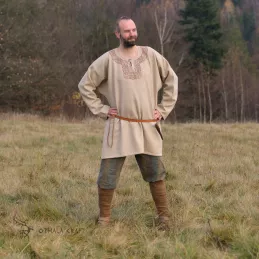 Decorated Viking tunic made of beige wool in herring bone pattern. High-quality wool, nice to the touch.
