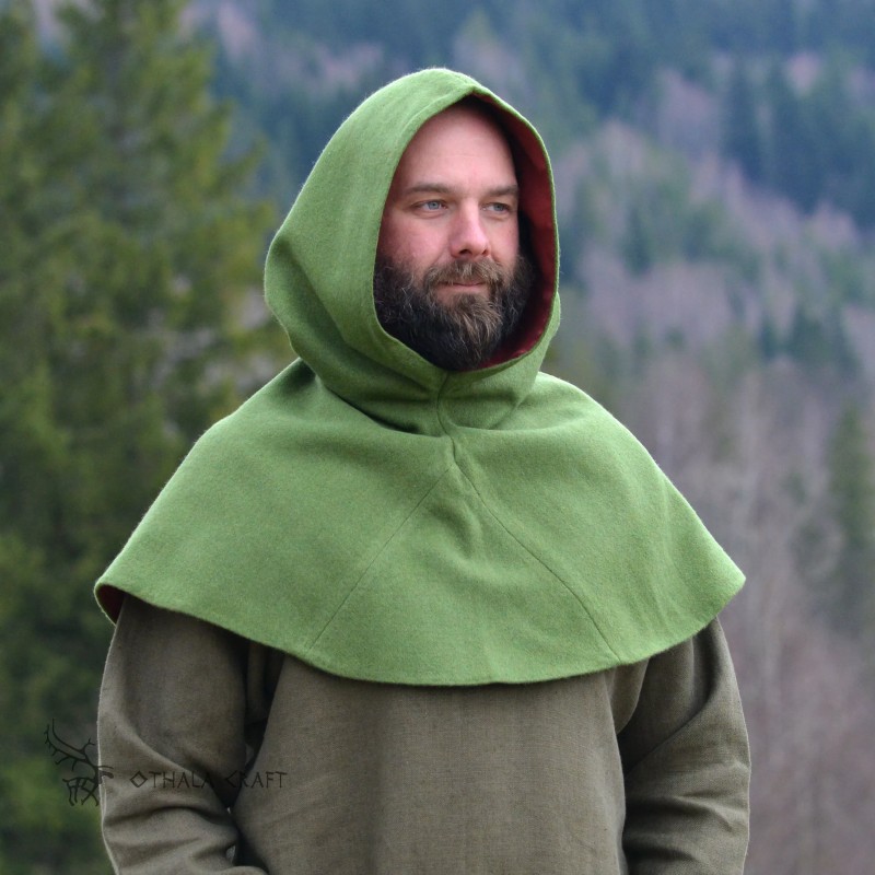 The shape of the hood is based on a find from Hedeby. Sewn high under the throat to protect from wind and cold.
