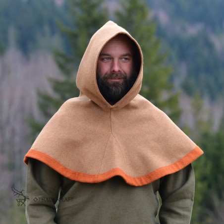 The shape of the hood is based on a find from Hedeby. Sewn high under the throat to protect from wind and cold.