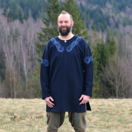 Decorated Viking tunic made of dark blue wool. Shape based on a find from Birka
